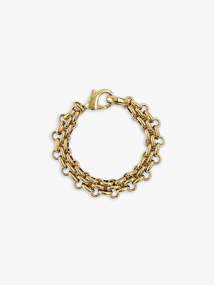 Gold chain bracelet featuring a double row of thick, oval links and a lobster clasp.