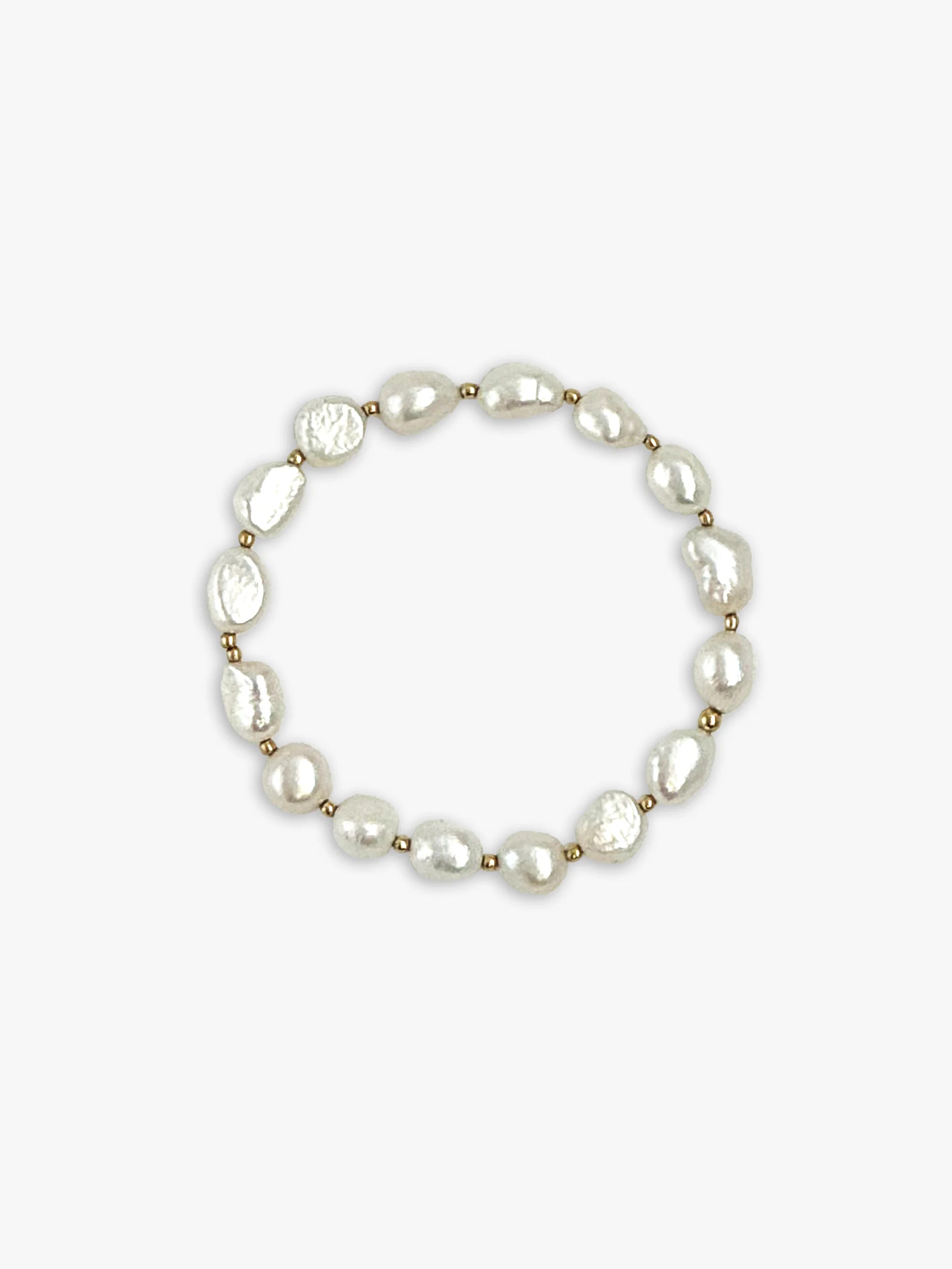 Bracelet with irregular off-white pearls and small gold beads.