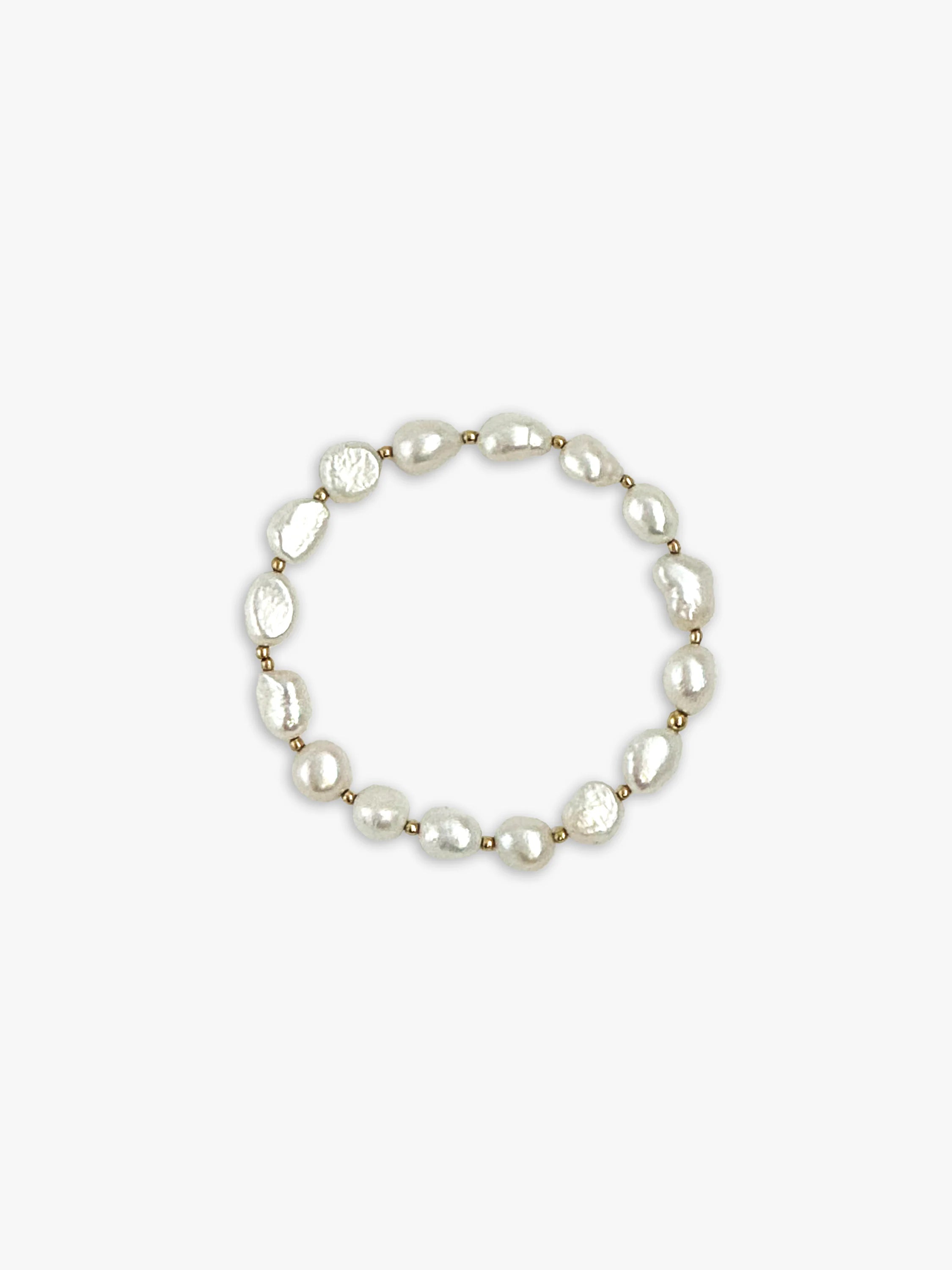 Off-white pearl bracelet with gold beads.
