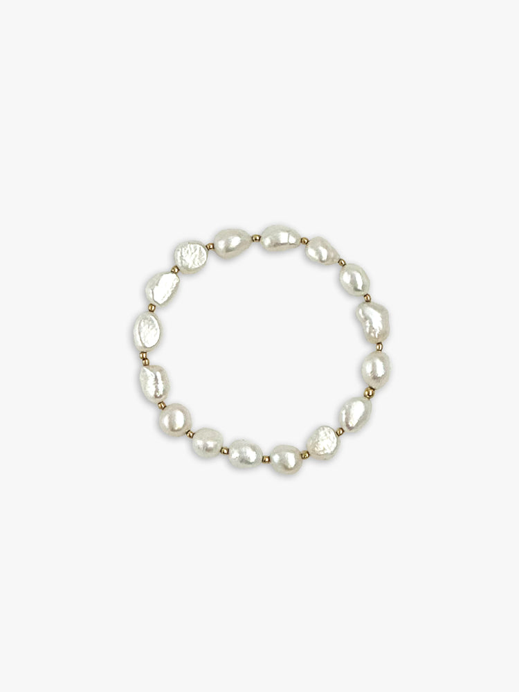 Off-white pearl bracelet with gold beads.