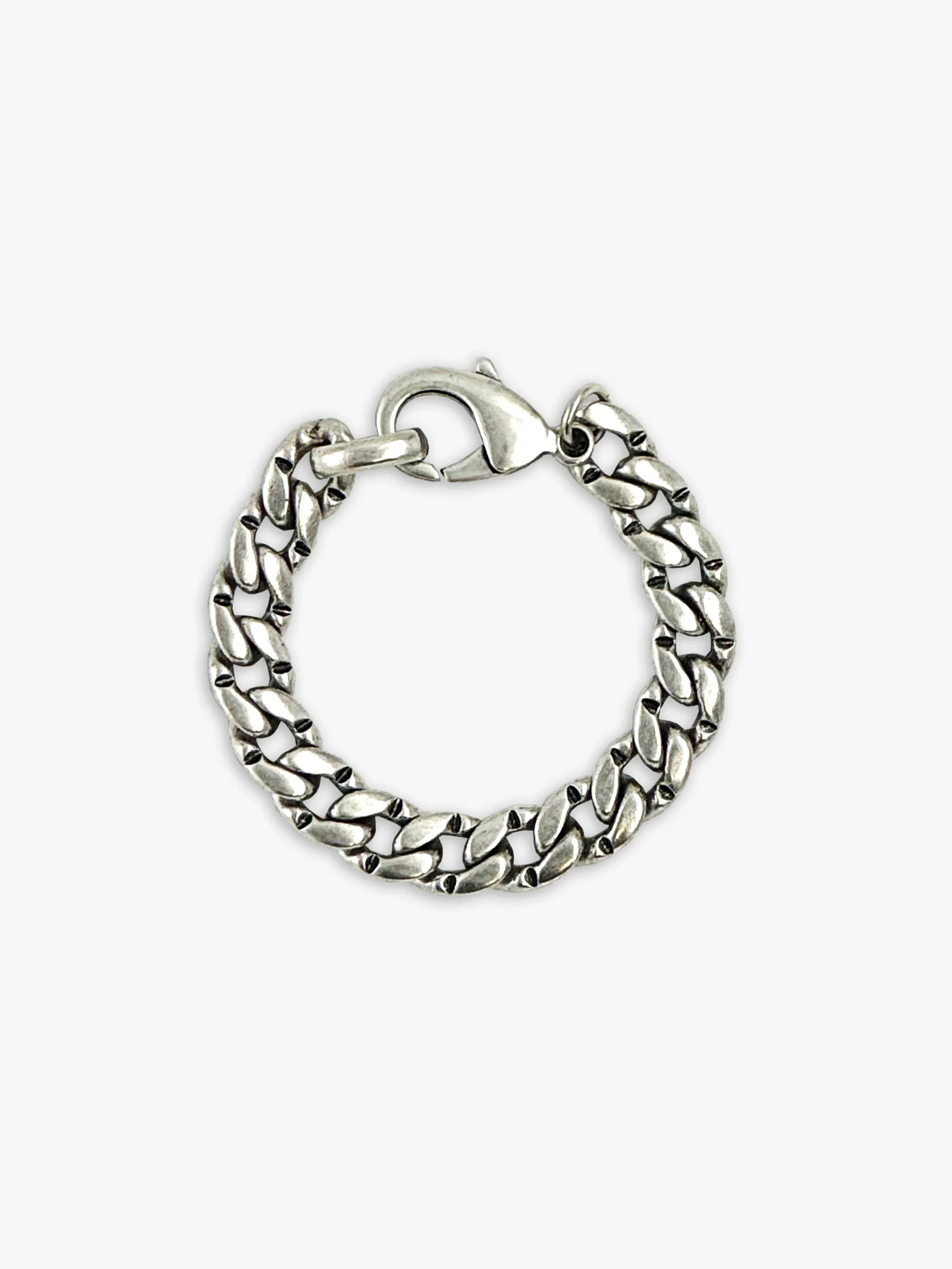 Silver curb chain bracelet with a lobster clasp.