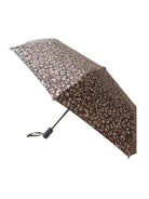 Travel umbrella with black, tan, and red-brown abstract pattern. Black handle and wrist strap.