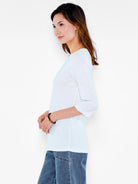 Pale blue 3/4 sleeve boat neck tee with relaxed fit, visible slub texture.
