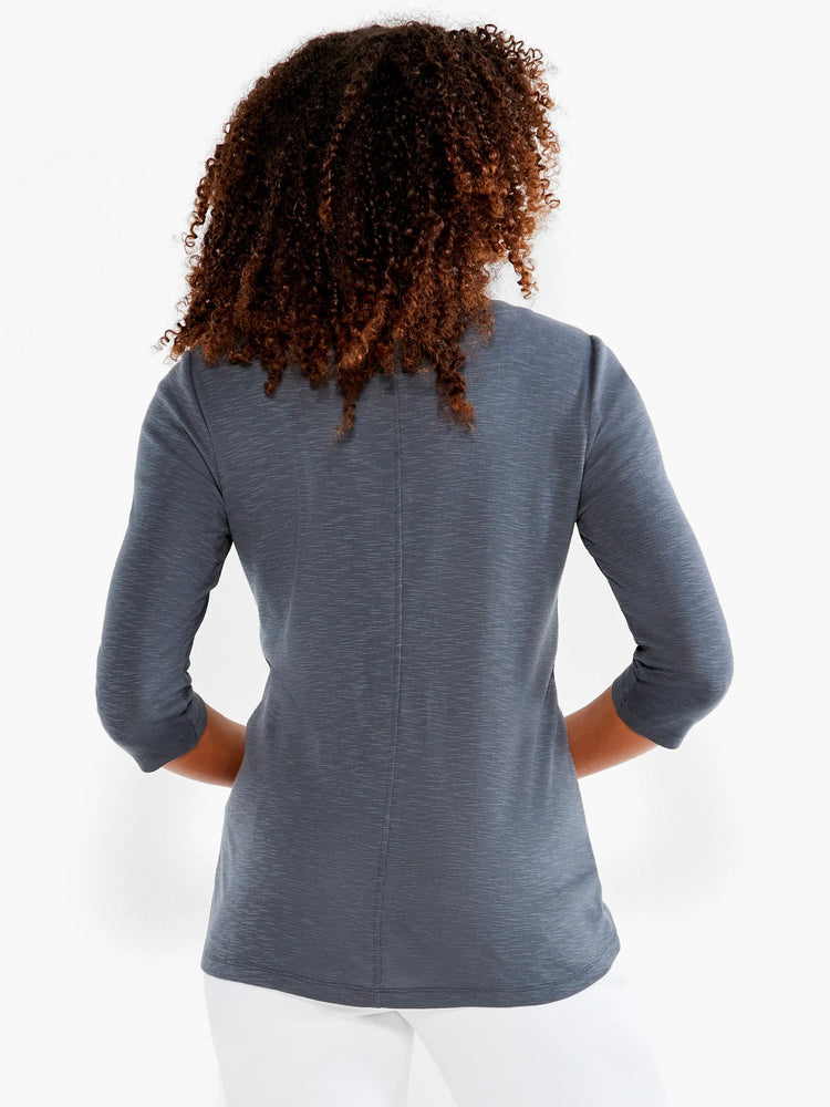 Dark grey heathered 3/4 sleeve tee with vertical center back seam. Model shown from behind.
