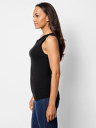 Black ribbed tank top, one-shoulder neckline.