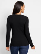 Black ribbed, long-sleeved shirt; split neckline.