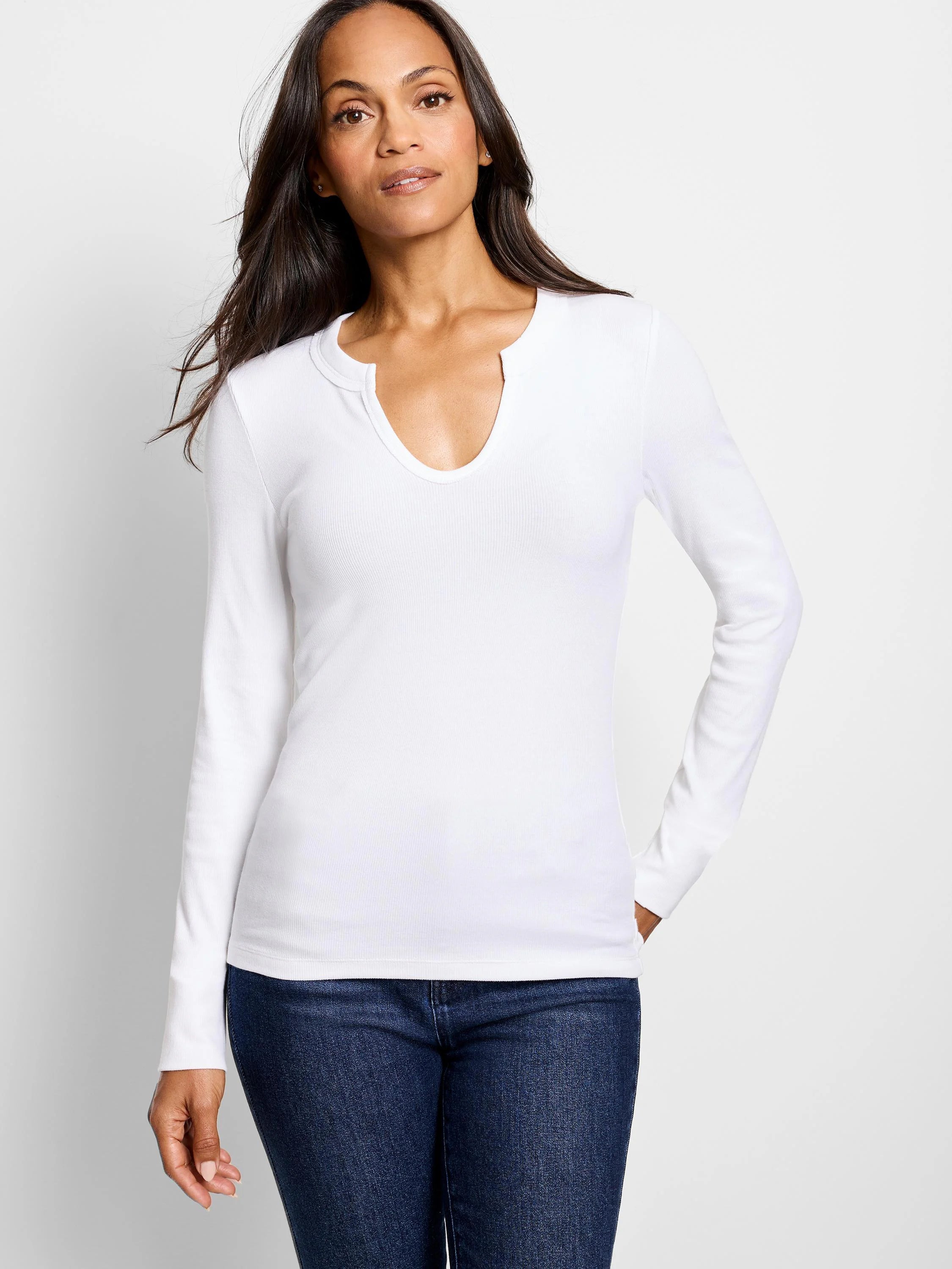 White ribbed long-sleeve shirt, split neckline.