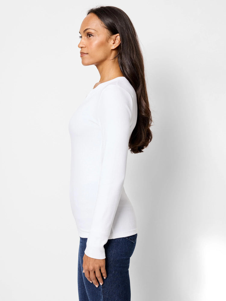 White ribbed, long-sleeved shirt; split neckline.