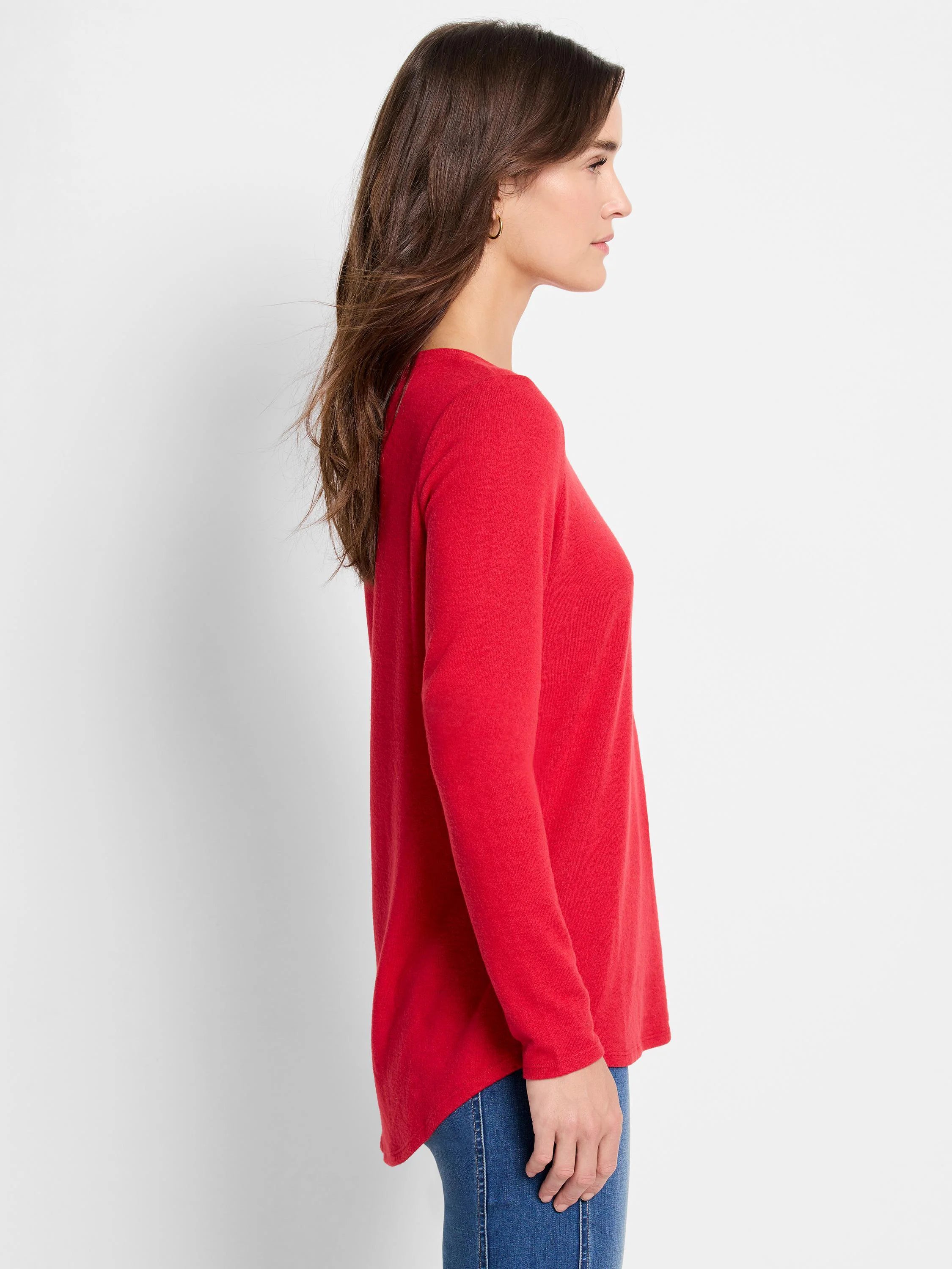 Red long-sleeve shirt, slightly longer in the back than the front.  Curved hem.