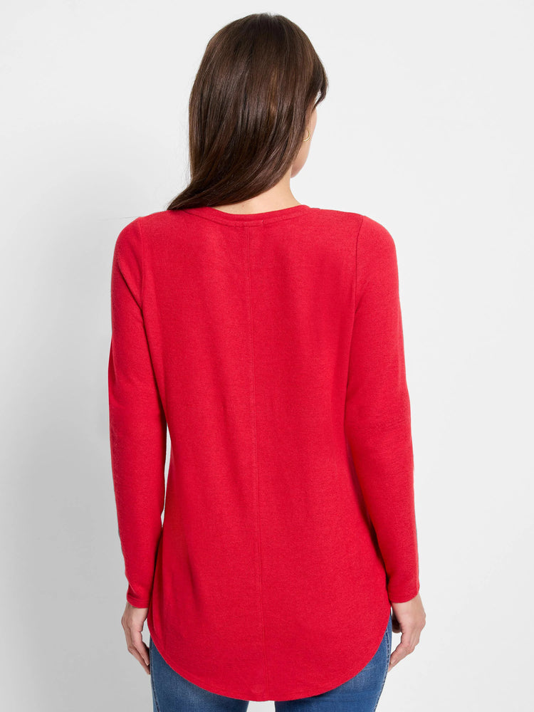 Red long-sleeve shirttail tee.  Curved hemline.  Solid color.
