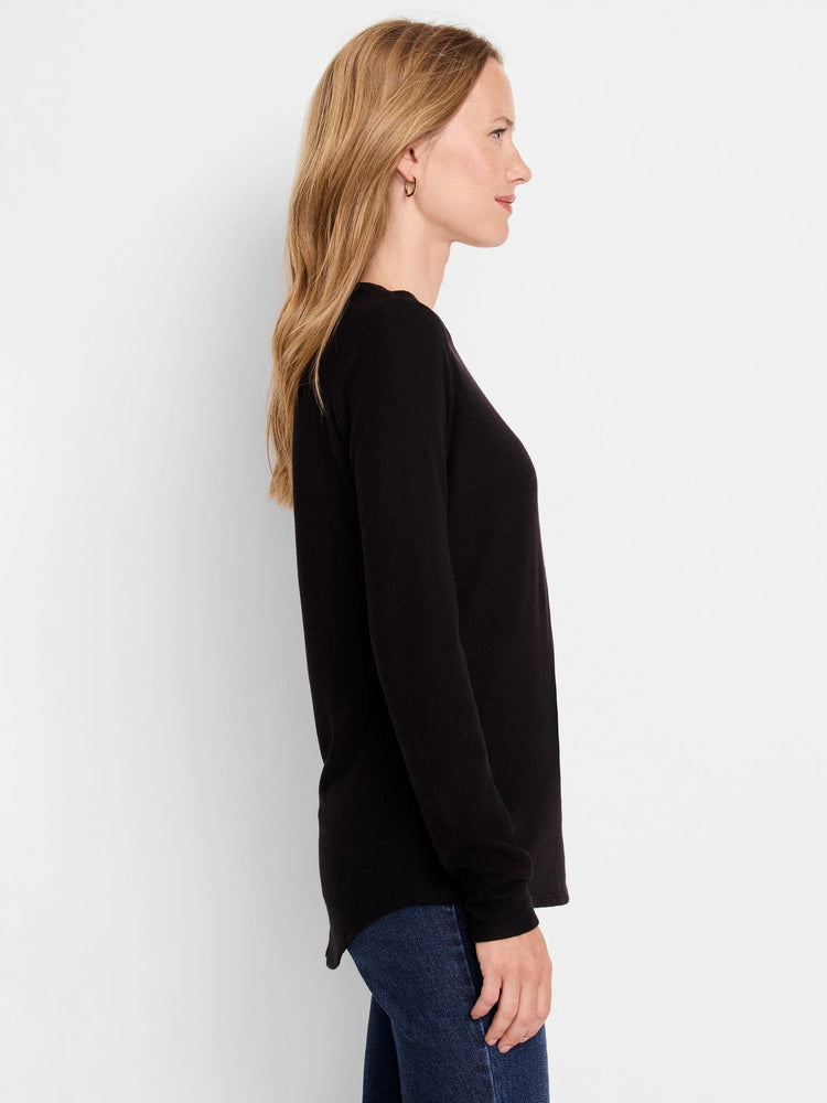 Black long-sleeve shirttail tee.  Side profile shows curved hemline.
