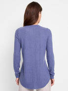 Here's alt text that describes the image concisely and accessibly:

"Rear view of a heather blue, long-sleeved shirttail...