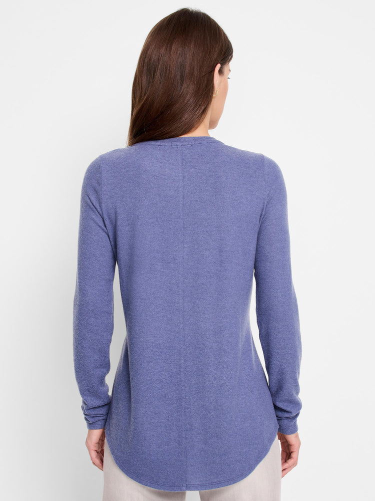 Here's alt text that describes the image concisely and accessibly:

"Rear view of a heather blue, long-sleeved shirttail...