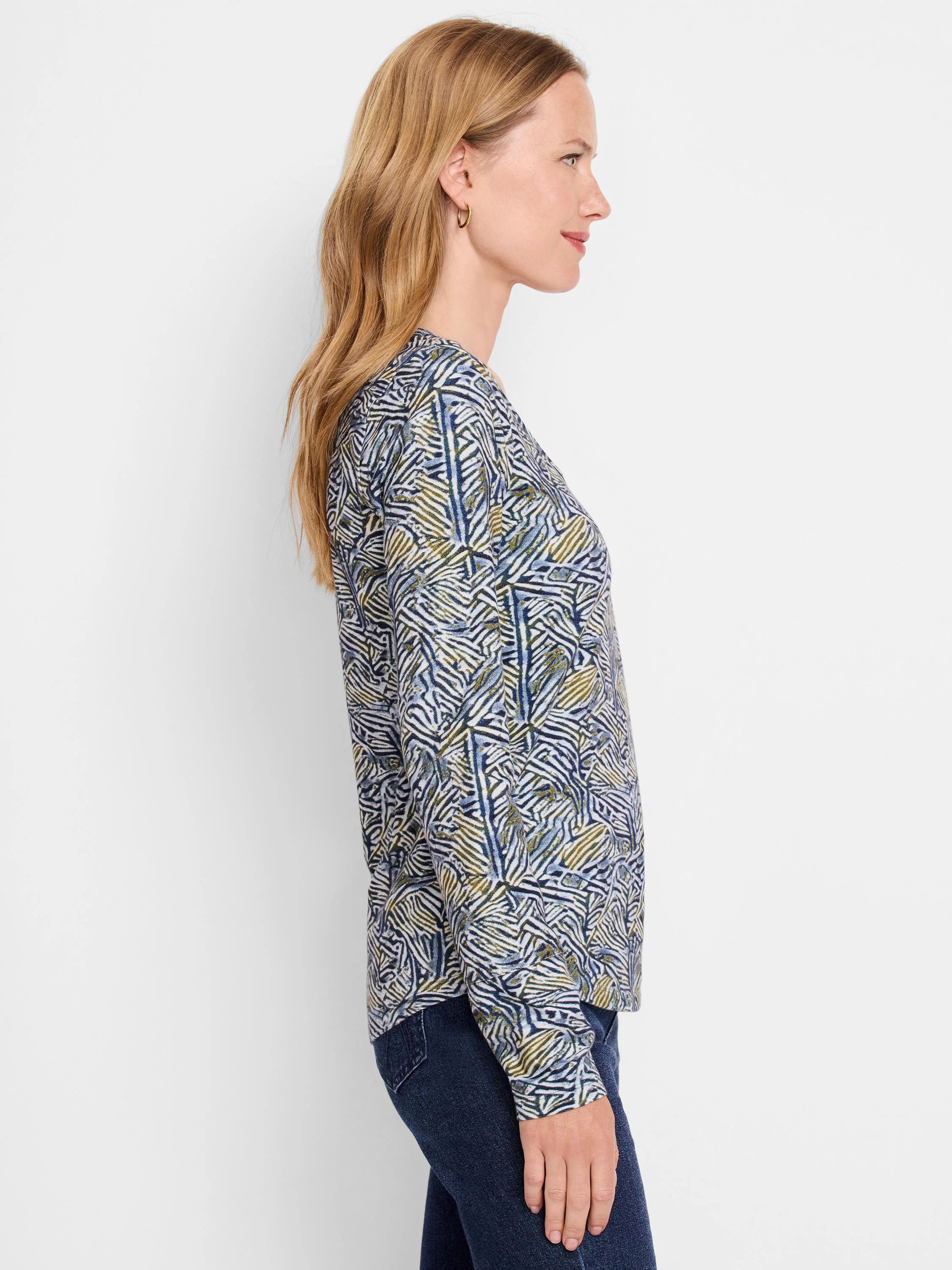 Long-sleeve scoop neck shirt;  blue, green, and white sketched lines pattern.