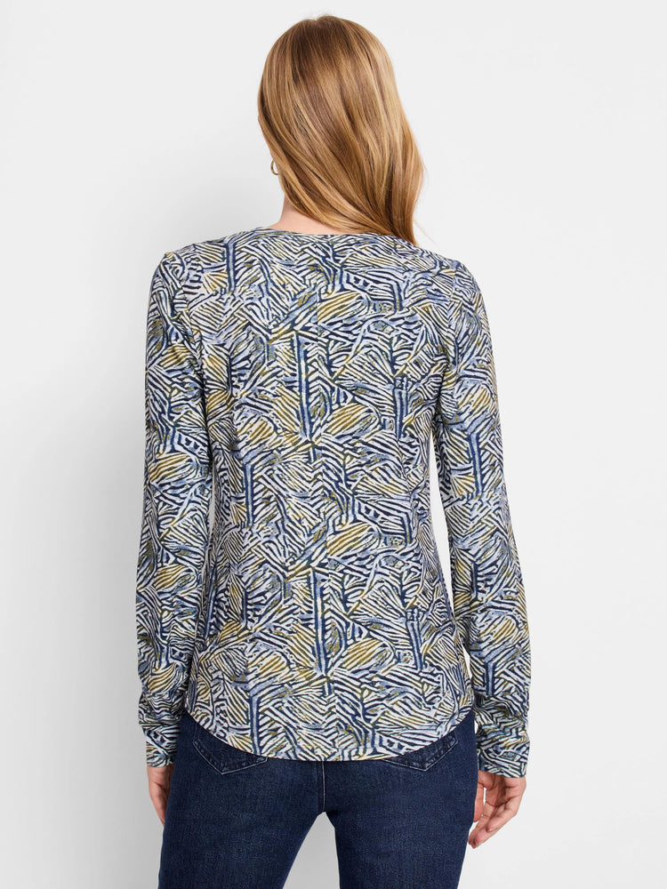 Long-sleeve scoop neck shirt;  blue, green, and white abstract sketched lines pattern.