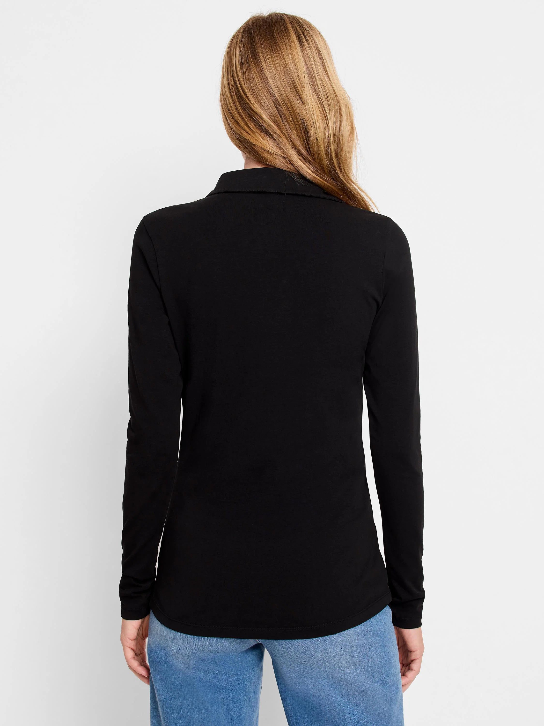 Black long-sleeve polo shirt; collared, fitted.  Rear view.