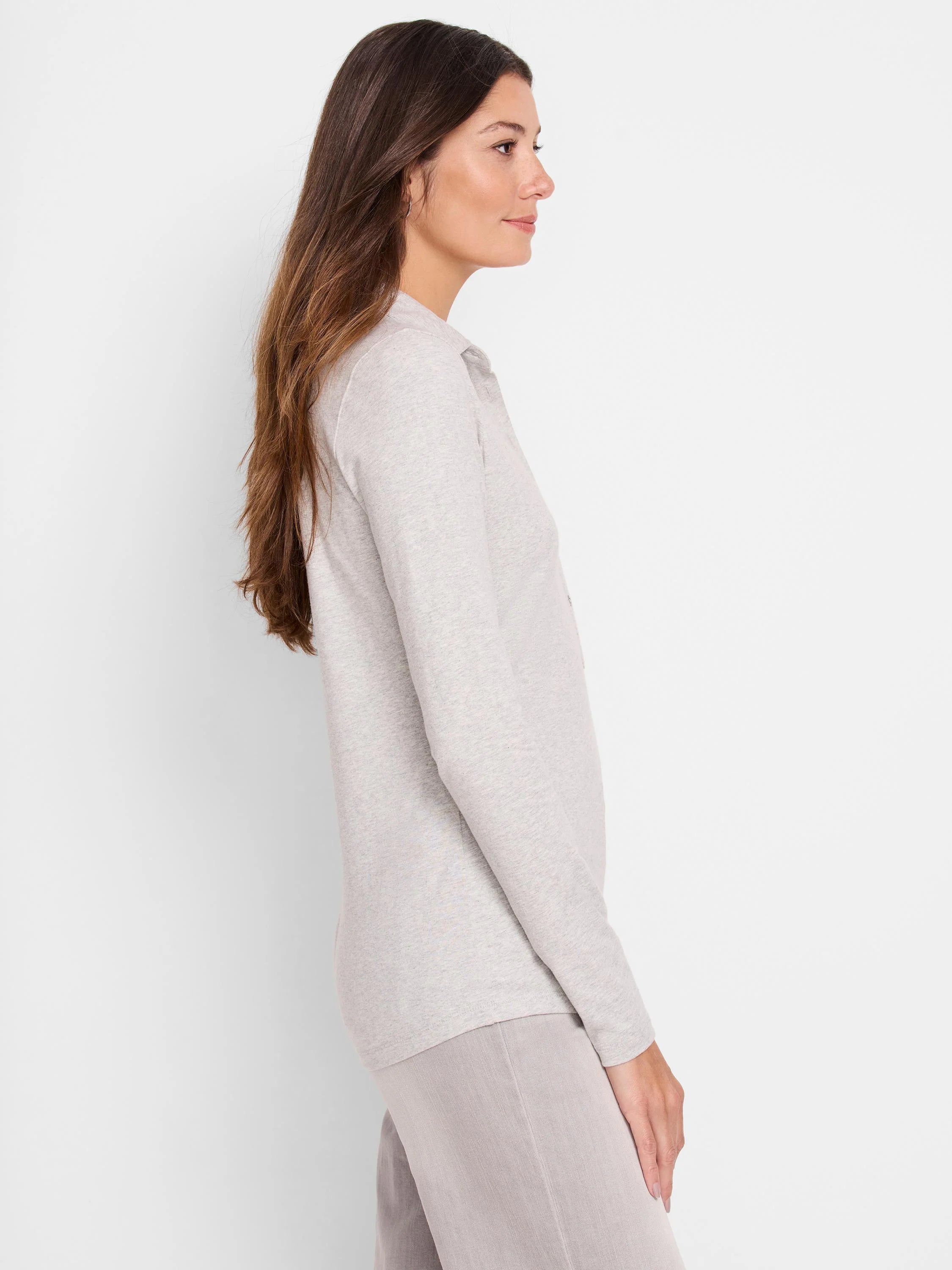 Light gray long-sleeve polo shirt;  collared, buttoned. Shown on model.