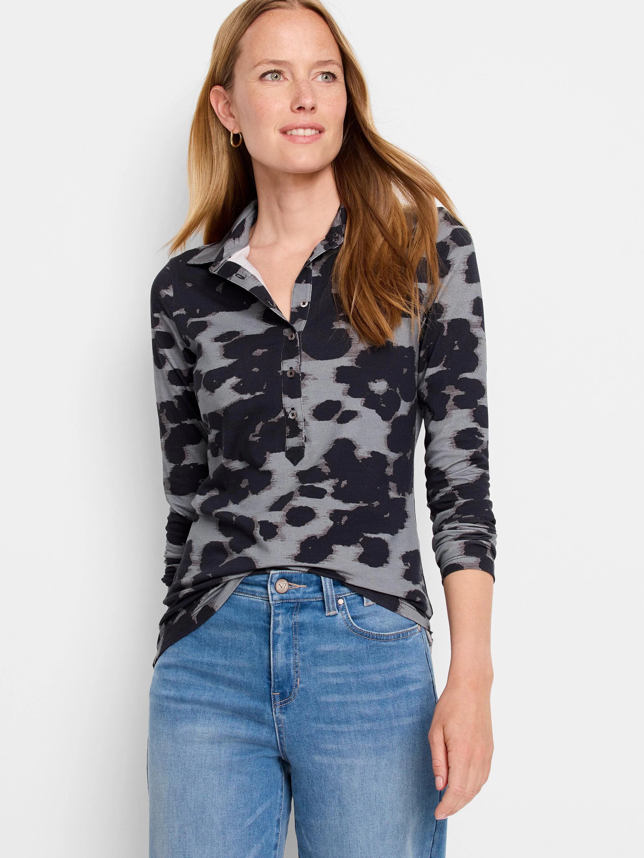 Long-sleeve polo shirt; gray and black abstract print on a dark gray base.  Button placket.