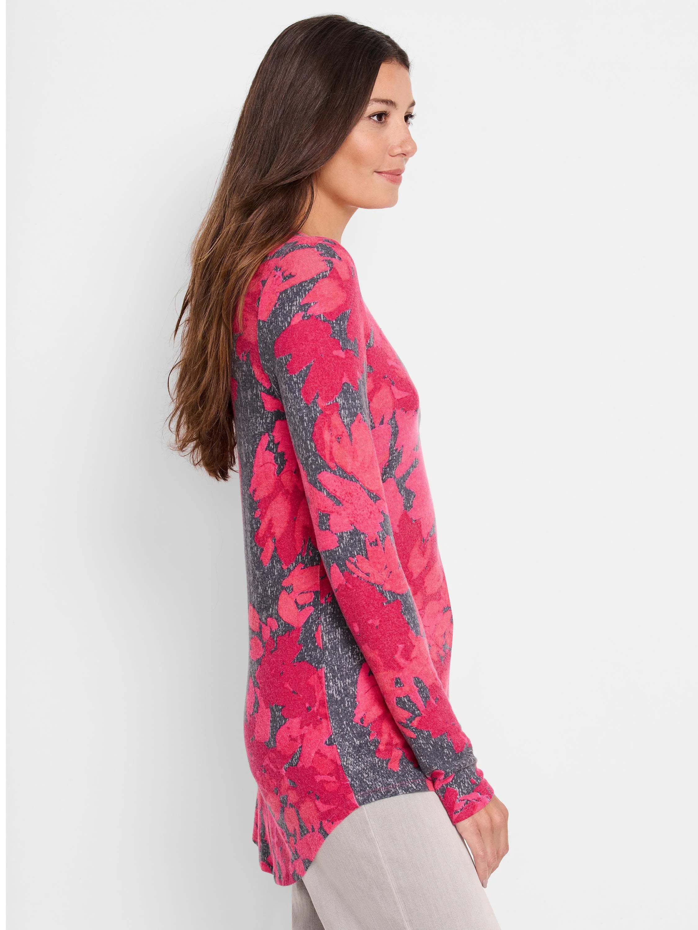 Long-sleeve shirttail tee. Pink floral pattern on gray background.  Curved hemline.