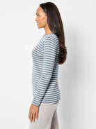 Image of light blue and gray horizontally striped long-sleeve boat neck shirt.