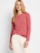Red and pink horizontal striped long-sleeved shirt; boat neck.