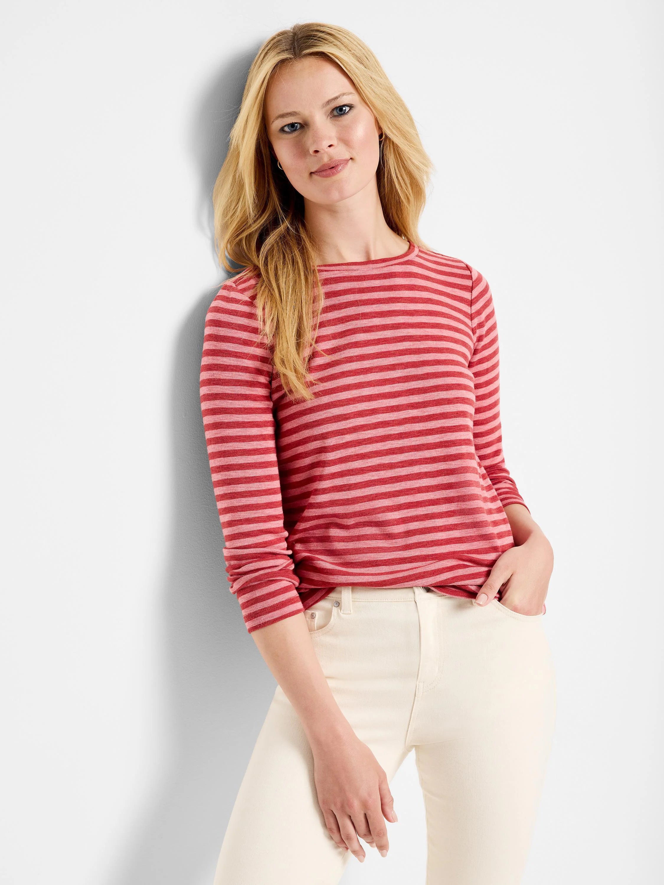 Red and pink horizontal striped long-sleeve shirt.  Crew neck.