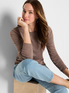 Heather brown long sleeve tee with a round neckline and subtle ribbed knit texture.