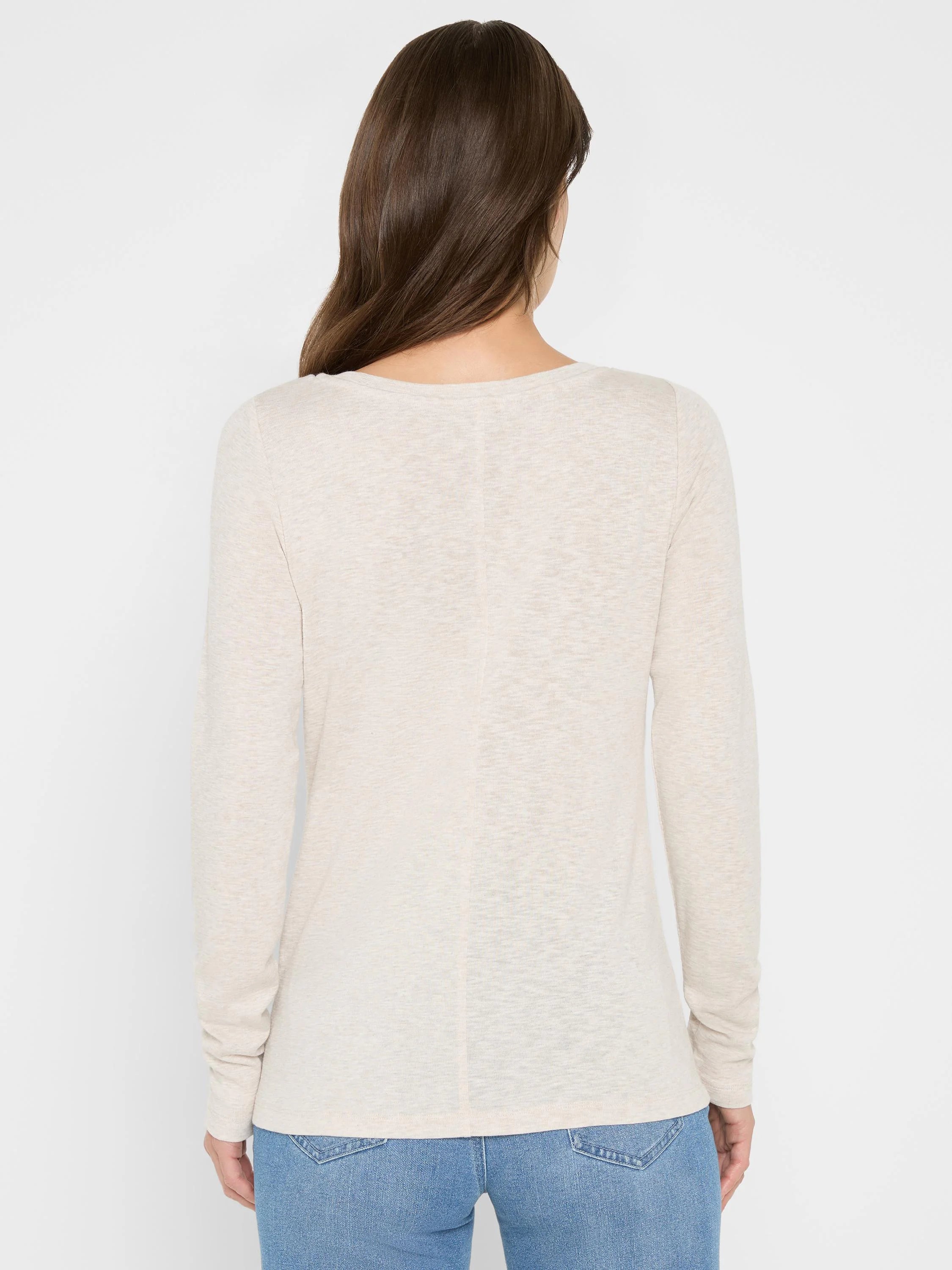 Beige long-sleeve boatneck shirt; rear view.  Slight texture visible.
