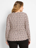 Long sleeve boat neck tee, back view, with an abstract dark brown & tan irregular pattern.