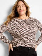 Cream & black abstract print long sleeve boat neck tee.