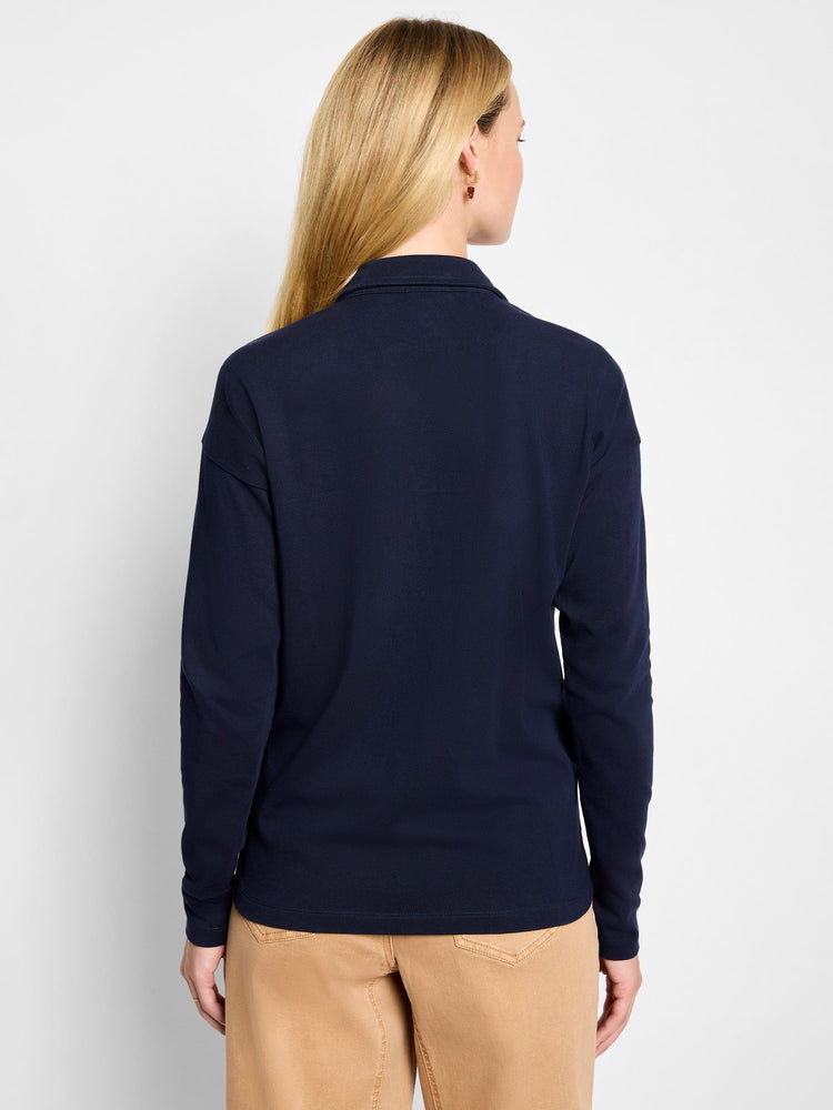Navy blue long-sleeve polo top, shown from the back on a model.