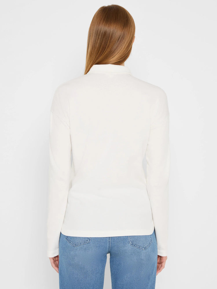 Ecru long-sleeve polo top on a model, viewed from the back.