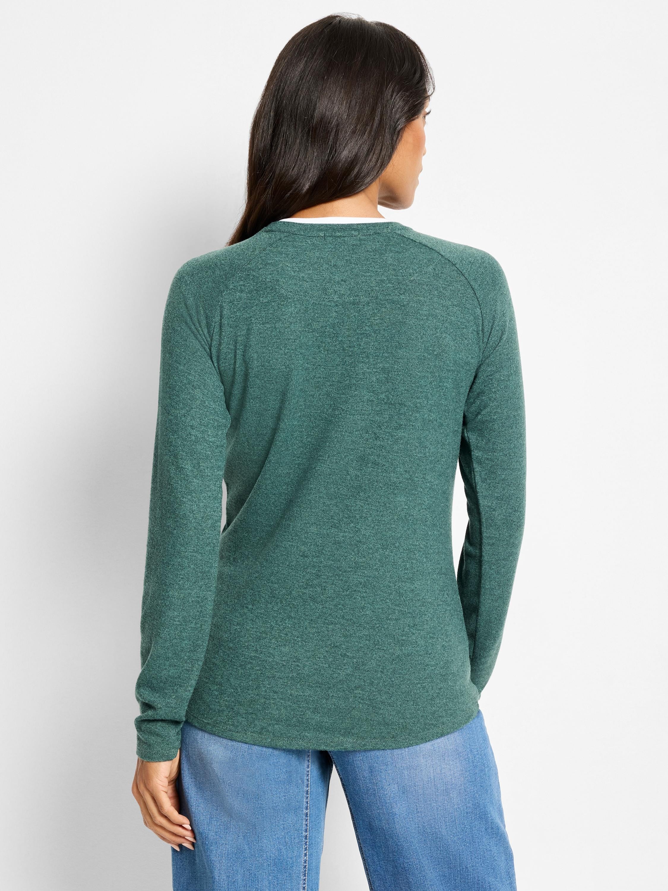 Marled green long-sleeve top with raglan sleeves and white inner layer visible at neckline, viewed from the back.