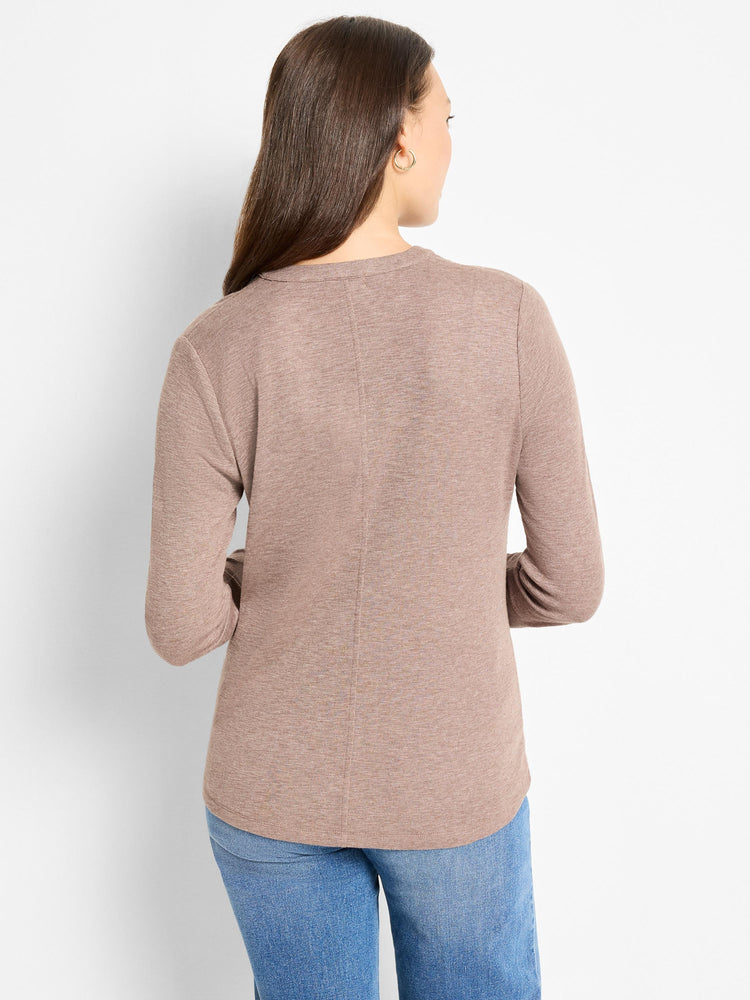 Here's alt text for the image, under 125 characters:

"Mauve long-sleeve henley shirt, shown from the back.  The shirt is...
