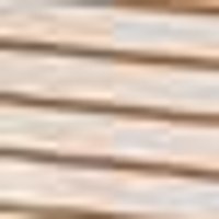 Light beige wood with faint brown horizontal grain.