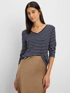 Navy and white striped long sleeve tee with a V-neck.