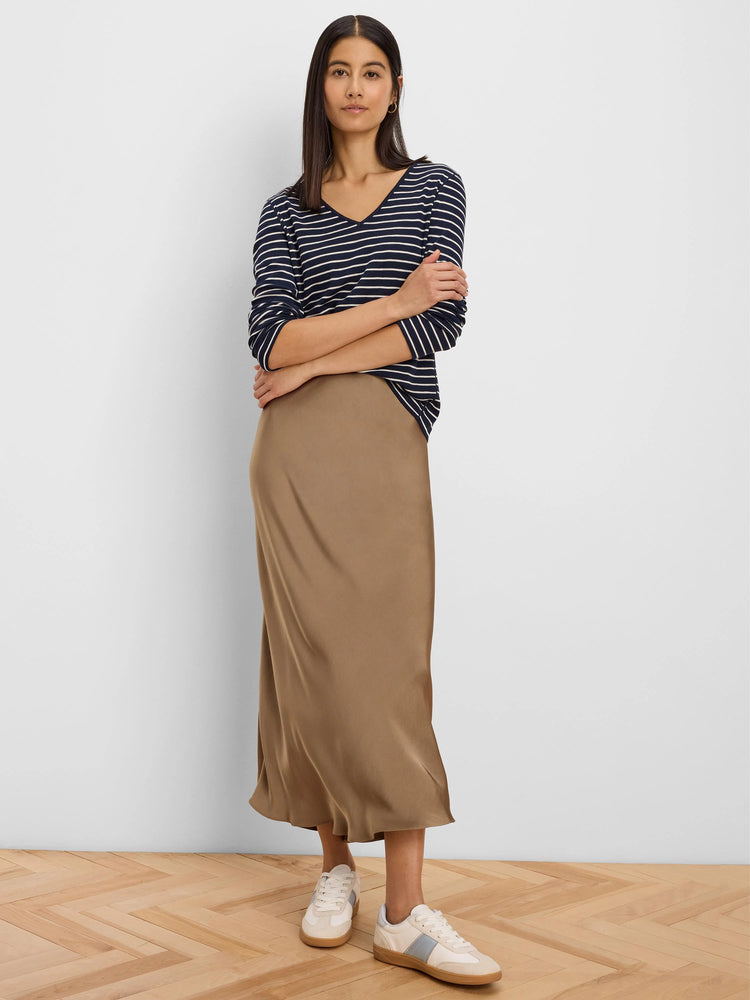 Navy blue long sleeve tee with thin white horizontal stripes, V-neck, and a relaxed fit.