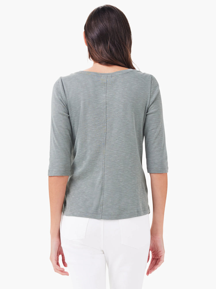Back view: heather grey-green 3/4 sleeve tee with marled texture and a vertical seam down the center.