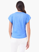 Here's alt text that meets the requirements:

"Back view of a light blue, short-sleeved shirt with flutter sleeves. The...
