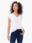 White v-neck tank top with short sleeves, shown on model.
