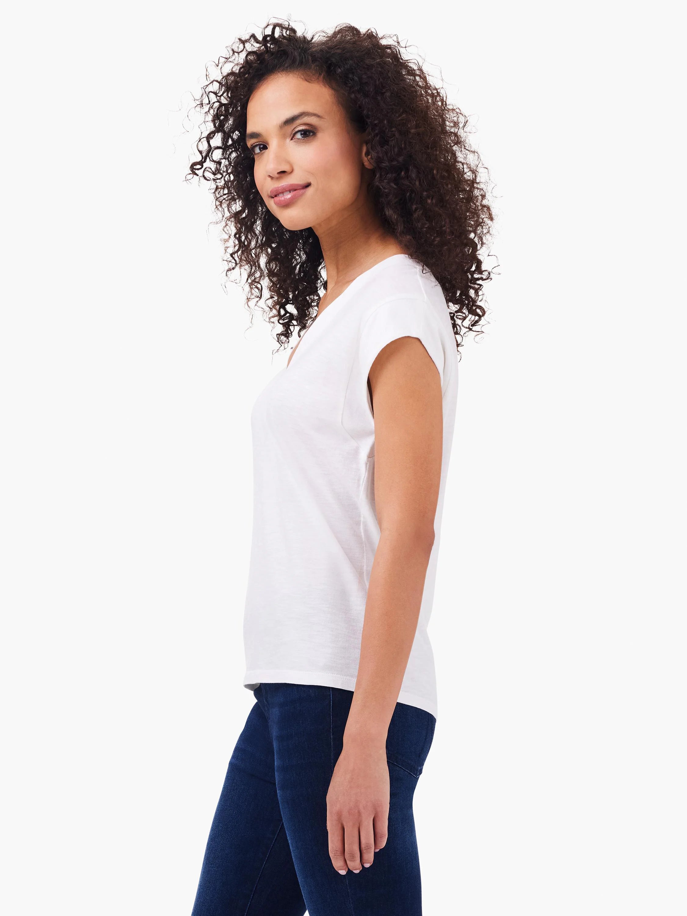 White v-neck, short-sleeve cotton tank top shown on model.