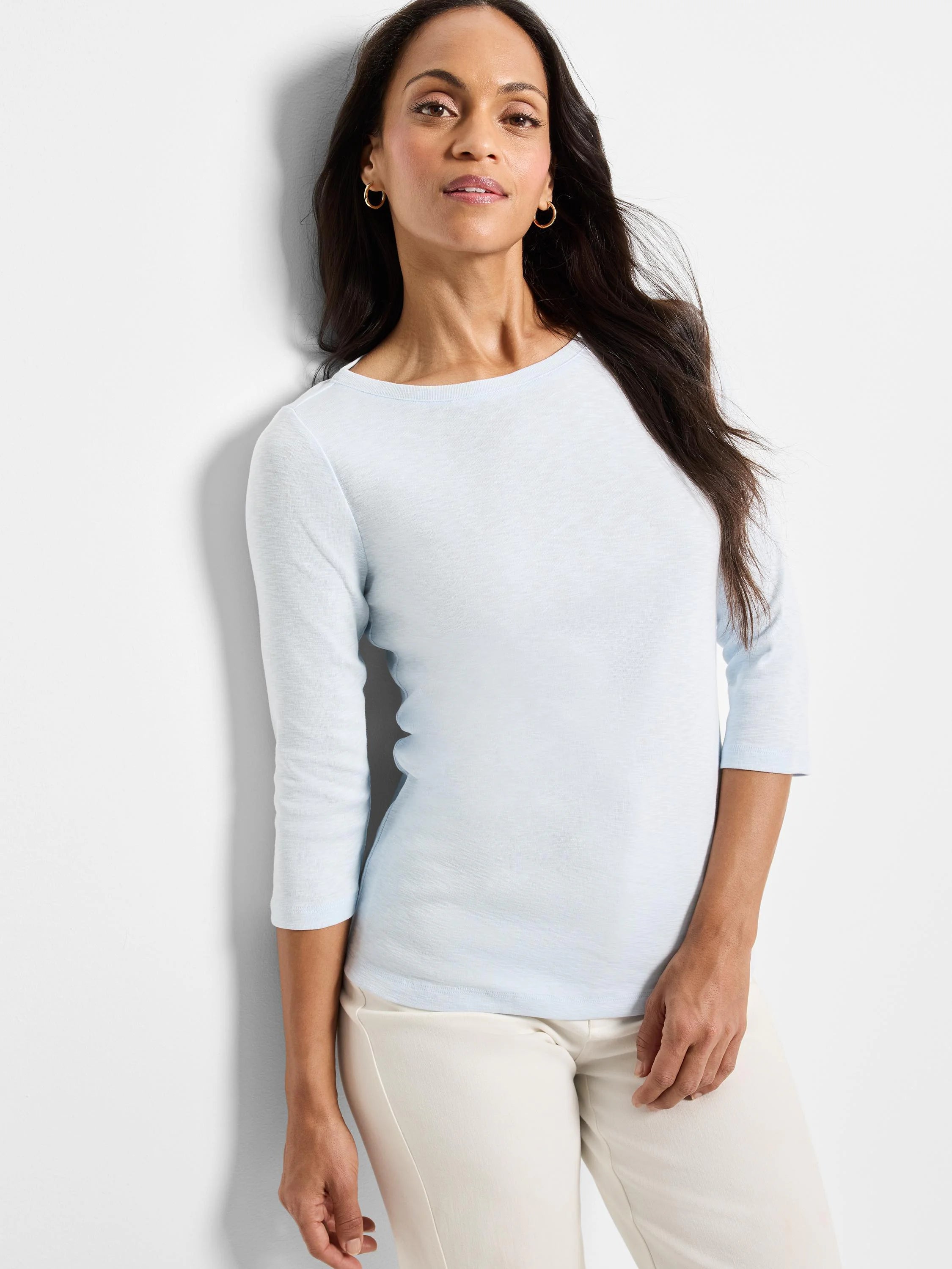 Pale blue 3/4 sleeve boat neck tee.
