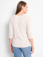 White and tan striped 3/4 sleeve boat neck tee, shown from the back.