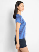Blue and dark blue horizontal striped short-sleeve crew neck t-shirt.