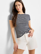 Navy blue and white horizontal striped short-sleeve shirt; crew neck.