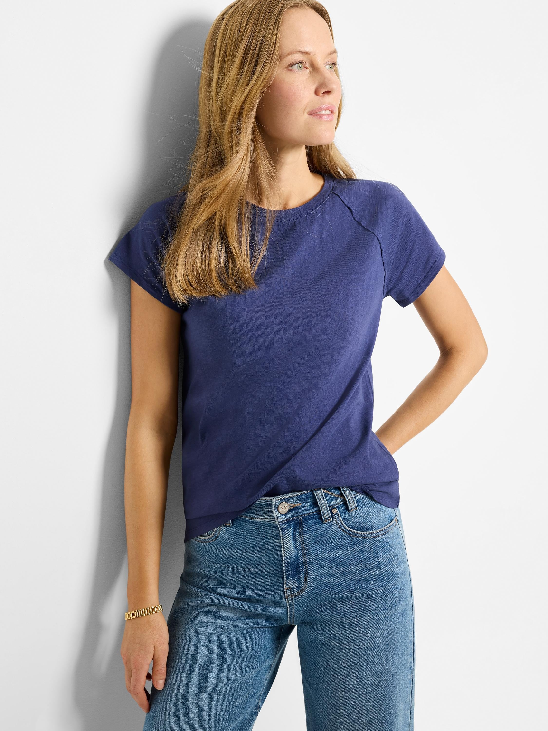 Dark blue, short-sleeved cotton t-shirt; crew neck, slightly slubbed texture.