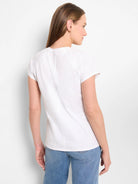 White cotton crew neck tee with short sleeves.  Back view shows seams at shoulders.