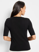 Black, elbow-length sleeve top with small gold buttons on shoulders.  Square neckline.