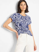 Crew neck, short-sleeve tee.  Navy blue and white abstract print on a white background.