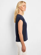 Navy blue V-neck tank top with rolled cap sleeves and a relaxed fit.